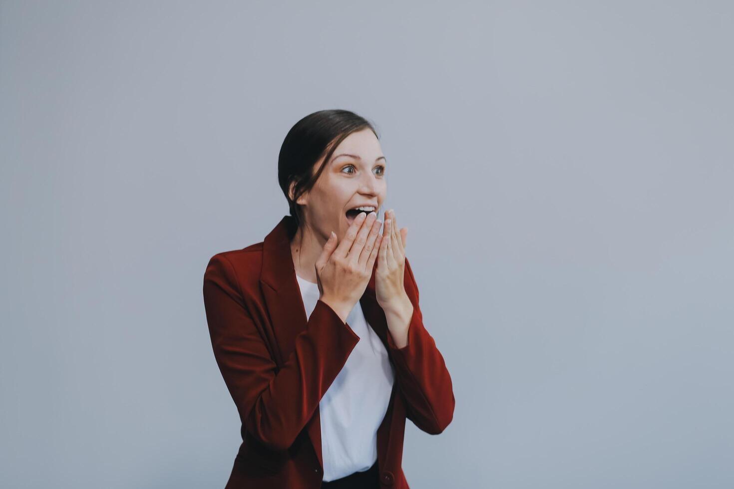 Happy young businesswoman on white background photo