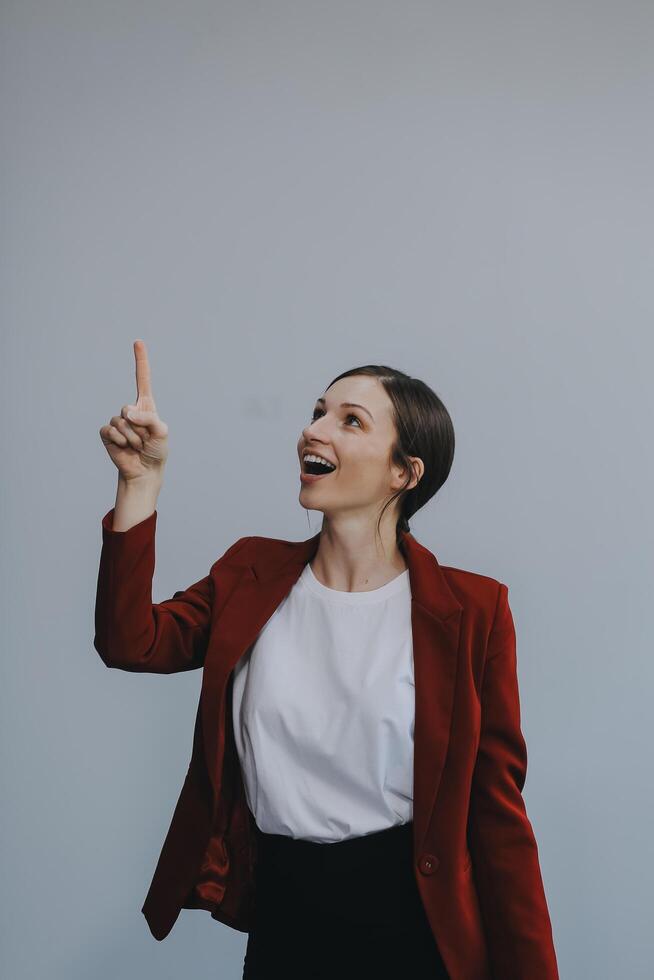 Happy young businesswoman on white background photo