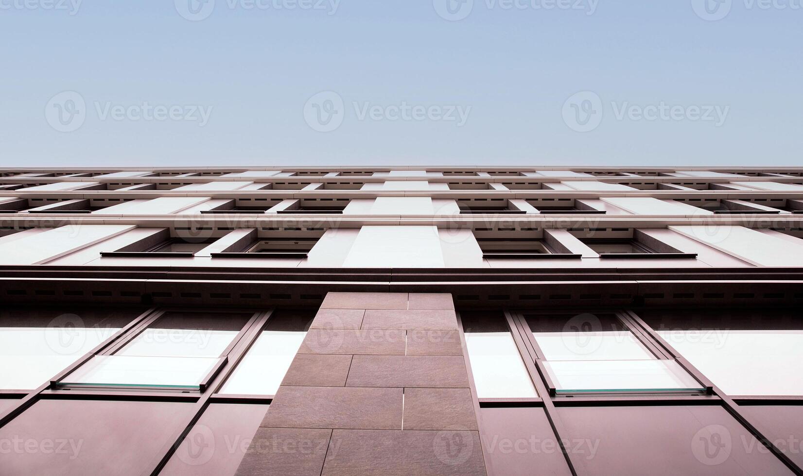 Modern Architectural Detail of Building Facade with Geometric Windows photo