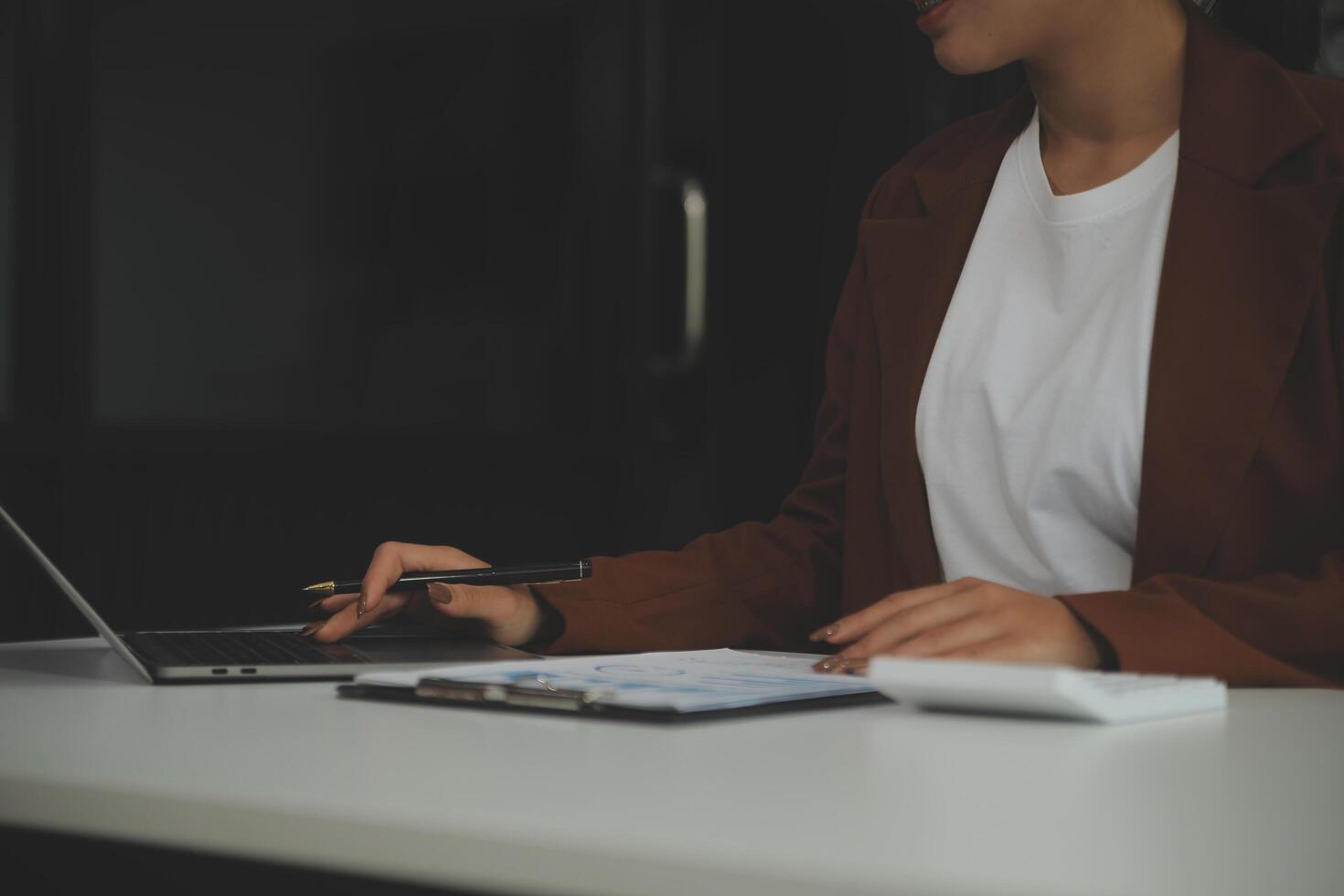 Business Documents, Auditor businesswoman checking searching document legal prepare paperwork or report for analysis TAX time,accountant Documents data contract partner deal in workplace office photo