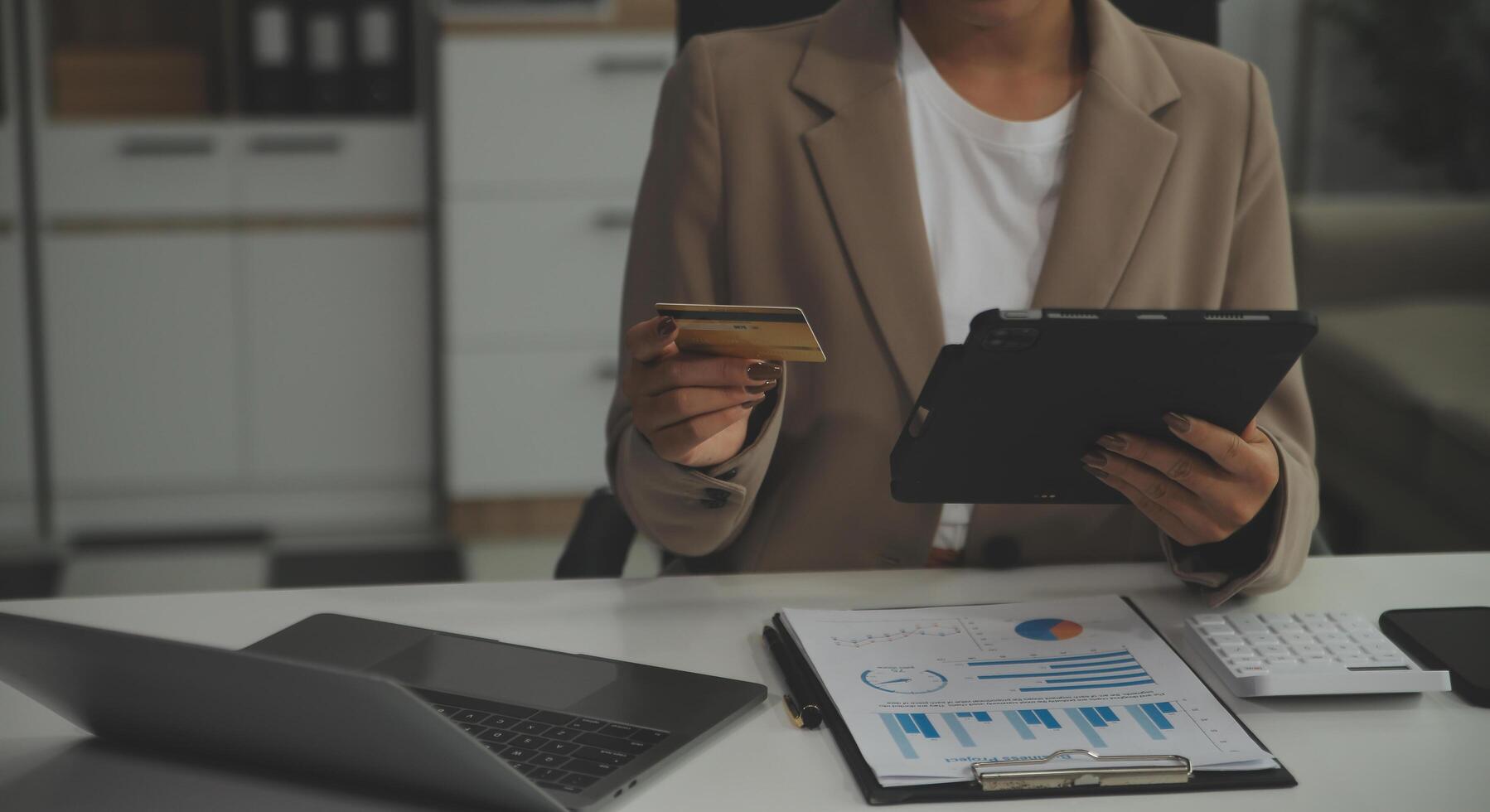 Business Documents, Auditor businesswoman checking searching document legal prepare paperwork or report for analysis TAX time,accountant Documents data contract partner deal in workplace office photo