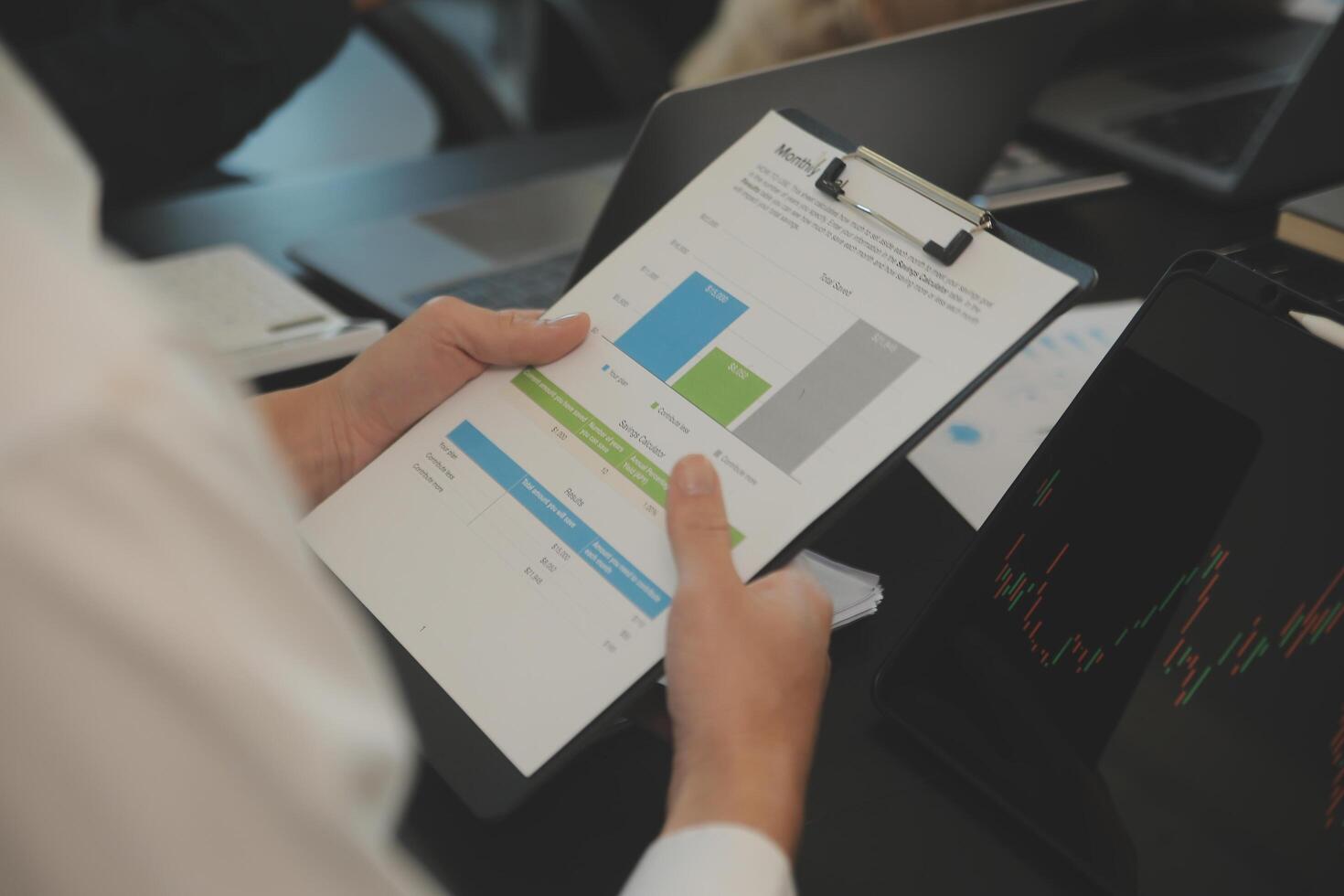 Business team collaboration discussing working analyzing with financial data and marketing growth report graph in team, presentation and brainstorming to strategy planning making profit of company. photo