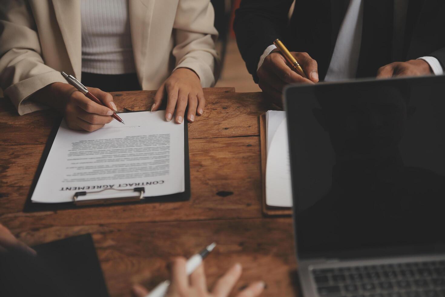 Good service cooperation, Consultation of Businesswoman and Male lawyer or judge counselor having team meeting with client, Law and Legal services concept. photo