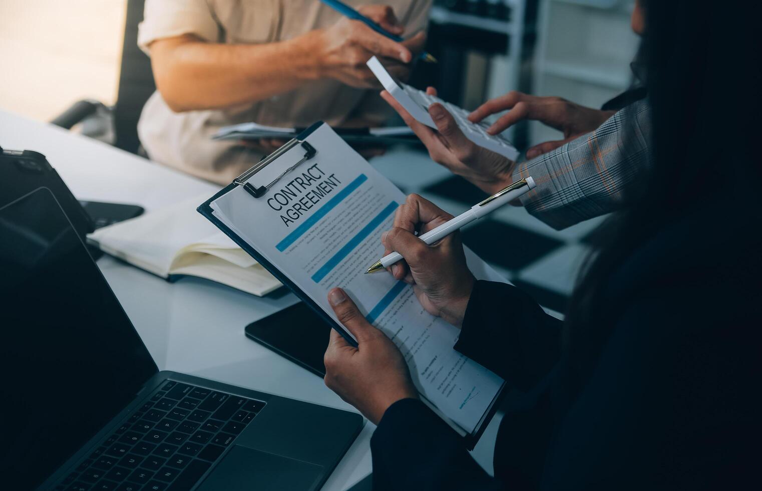 Finance manager meeting discussing company growth project success financial statistics, professional investor working start up project for strategy plan with document, laptop and digital tablet. photo