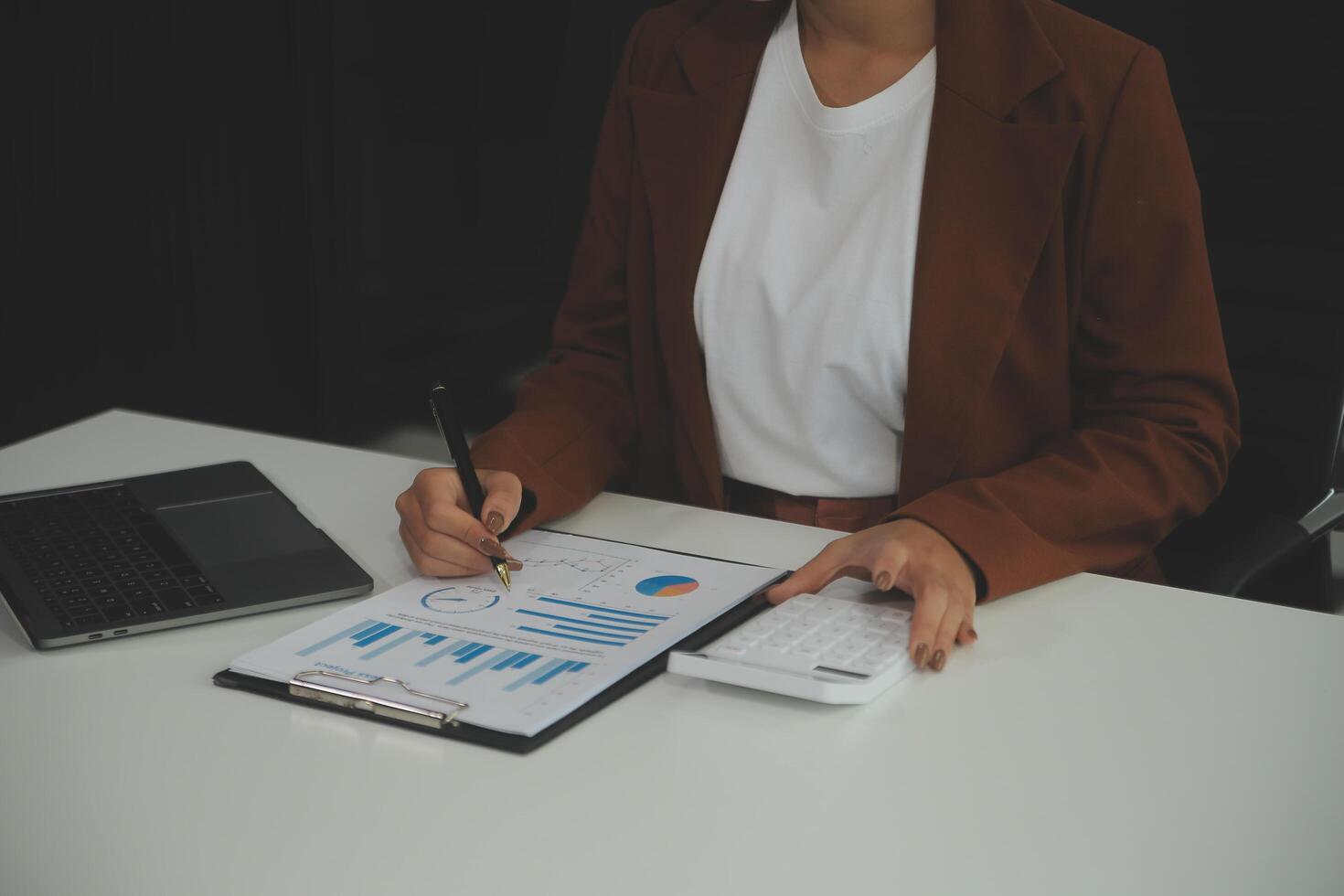Business Documents, Auditor businesswoman checking searching document legal prepare paperwork or report for analysis TAX time,accountant Documents data contract partner deal in workplace office photo