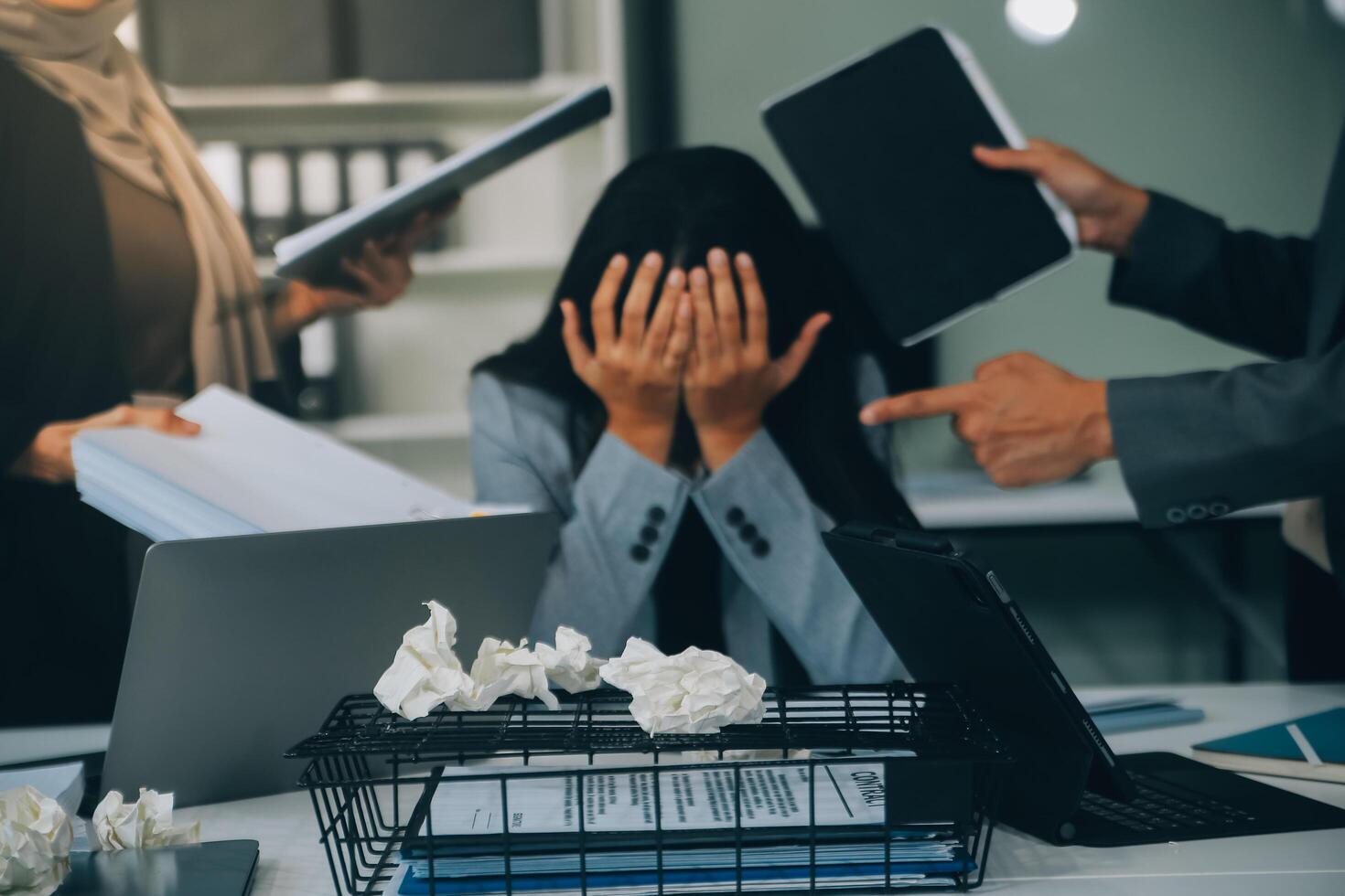 Stressful business man have so many paperwork in the office photo