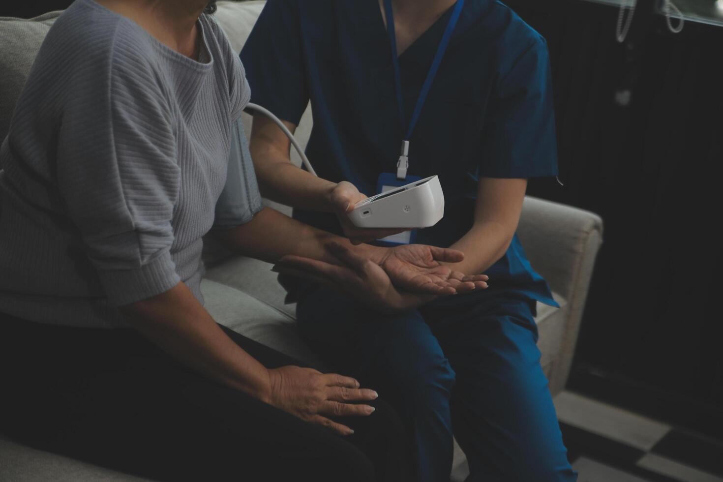 Doctor doing professional pressure examine her young patient photo