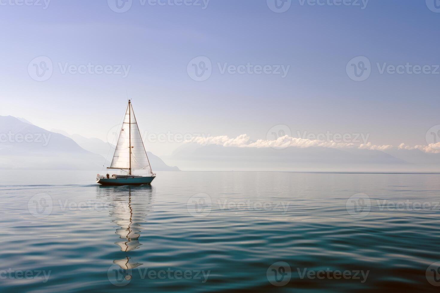 Sailboat drifting lazily on calm lake, its sails billowing in the gentle summer breeze photo