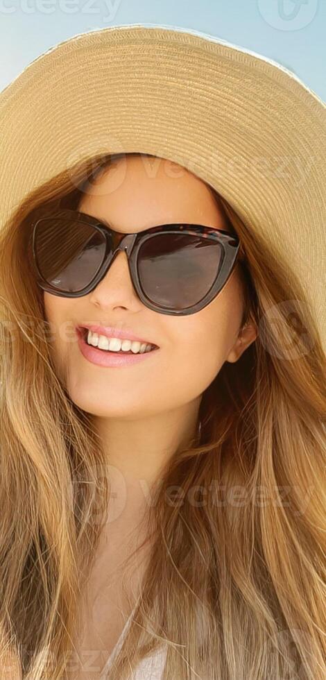 Beauty, summer holiday and fashion, face portrait of happy woman wearing hat and sunglasses by the sea, for sunscreen spf cosmetics and beach lifestyle look photo
