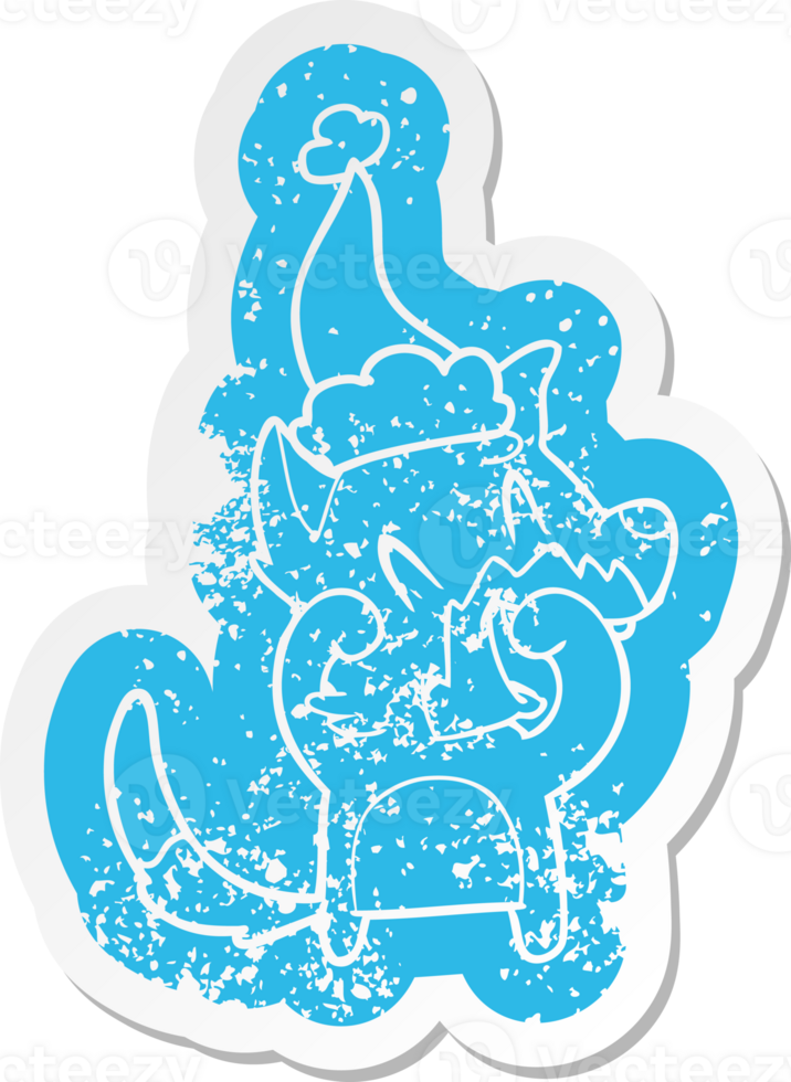 laughing fox cartoon distressed sticker of a wearing santa hat png