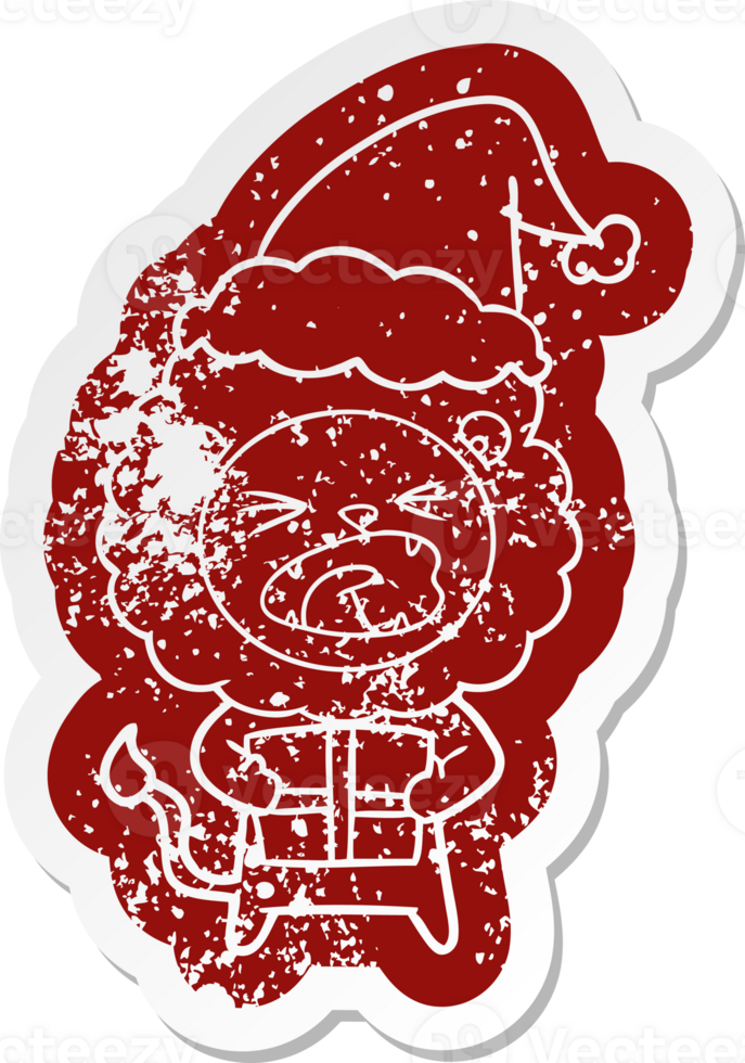 quirky cartoon distressed sticker of a lion with christmas present wearing santa hat png