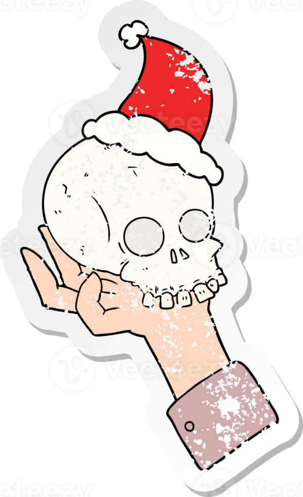 hand drawn distressed sticker cartoon of a hand holding skull wearing santa hat png