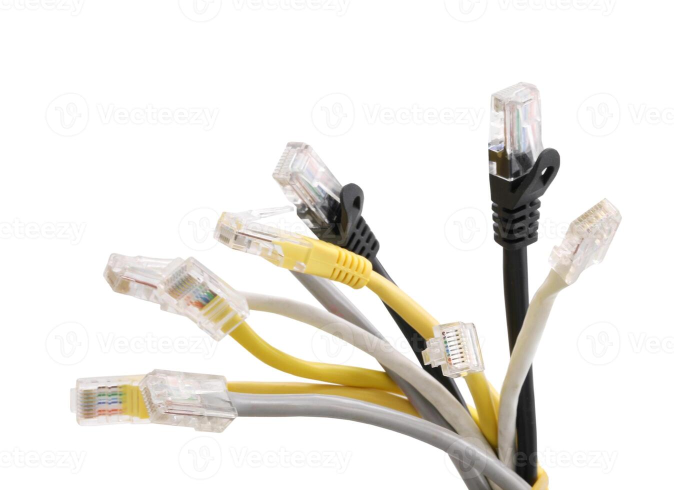 Multi colored network cables with molded RJ45 plug isolated on white background photo