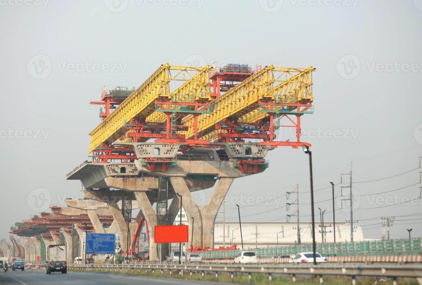 Machinery for placing precast segments over columns for the deck of elevated road. photo