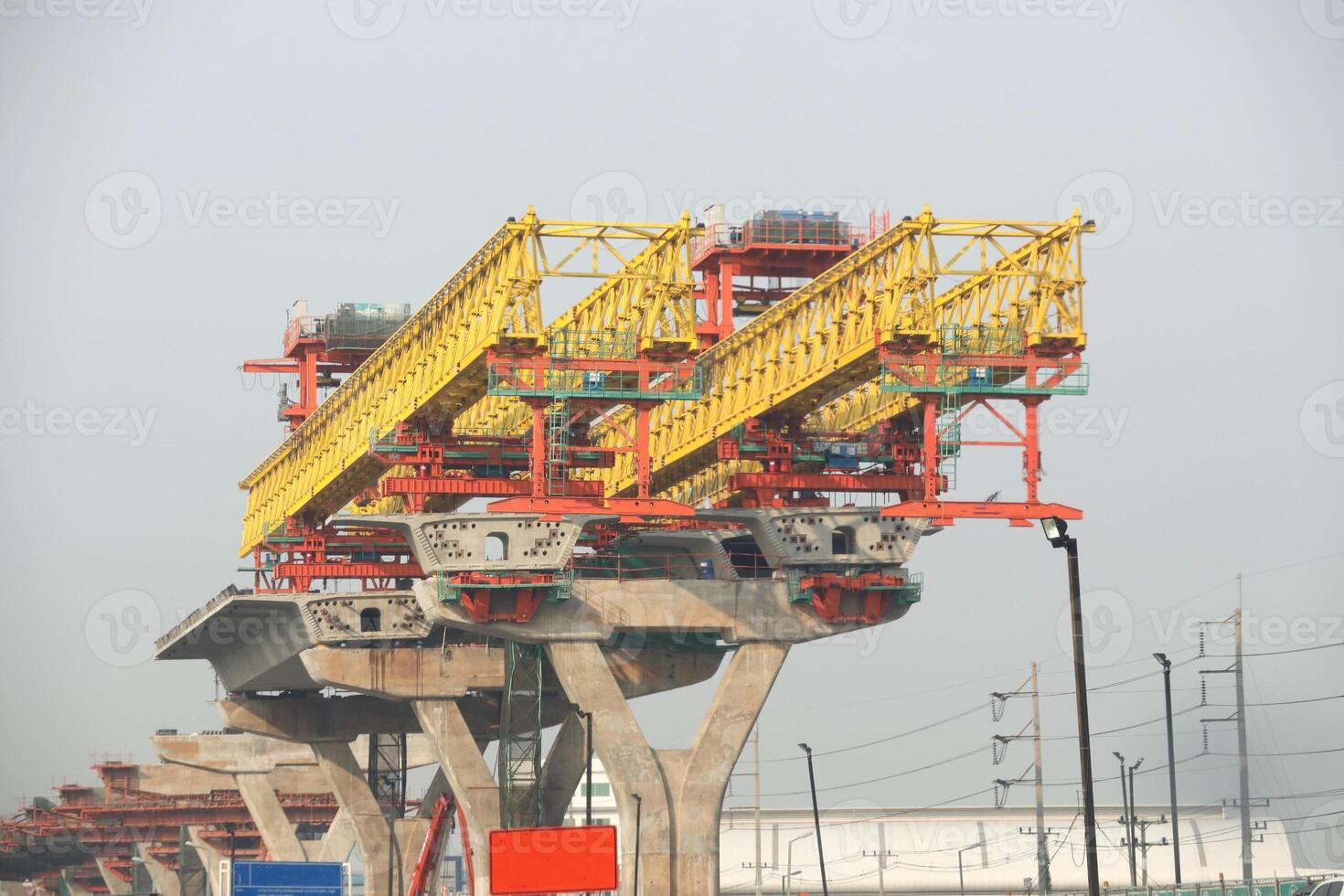 Machinery for placing precast segments over columns for the deck of elevated road. photo