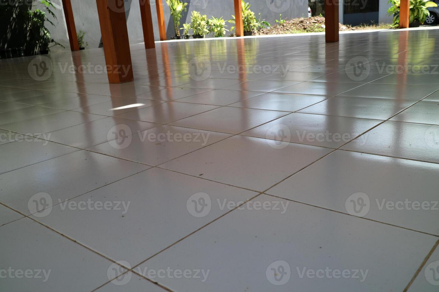 the floor of a building is made of clean white ceramic photo