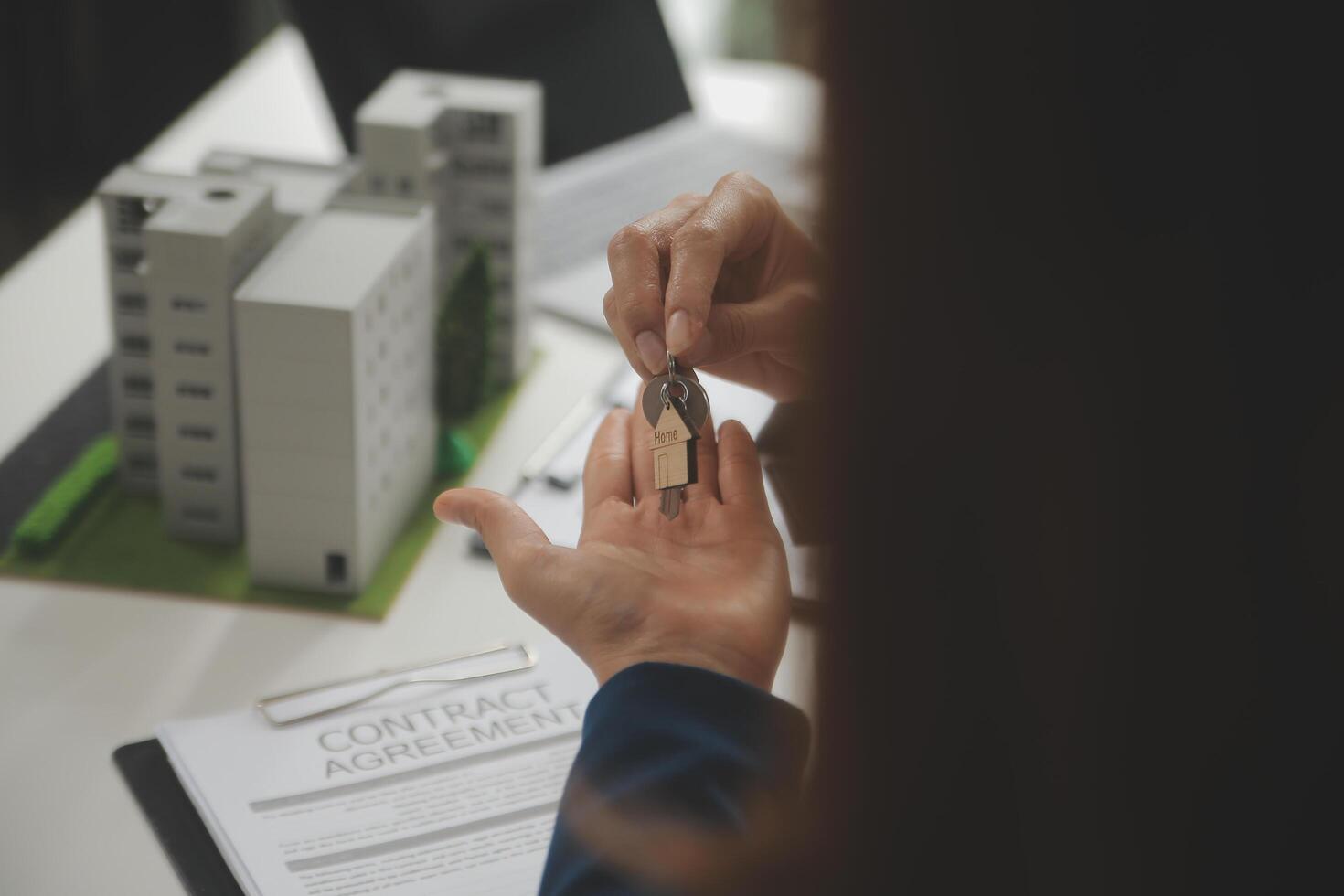Business Signing a Contract Buy - sell house, insurance agent analyzing about home investment loan Real Estate concept. photo
