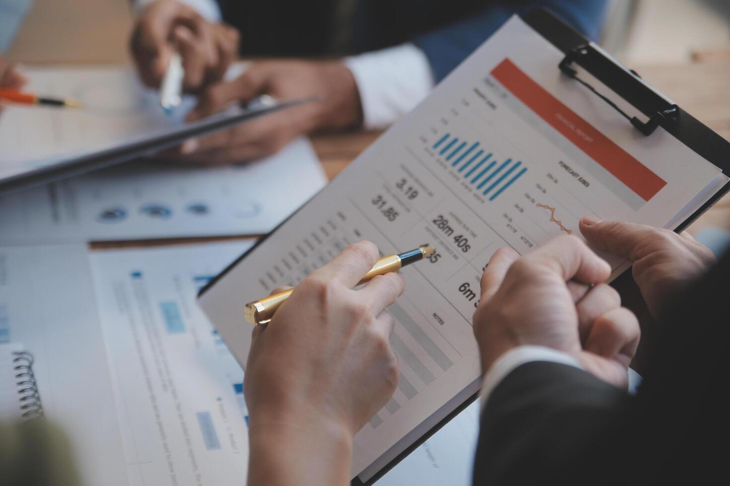 Co working conference, Business team meeting present, investor colleagues discussing new plan financial graph data on office table with laptop and digital tablet, Finance, accounting, investment. photo