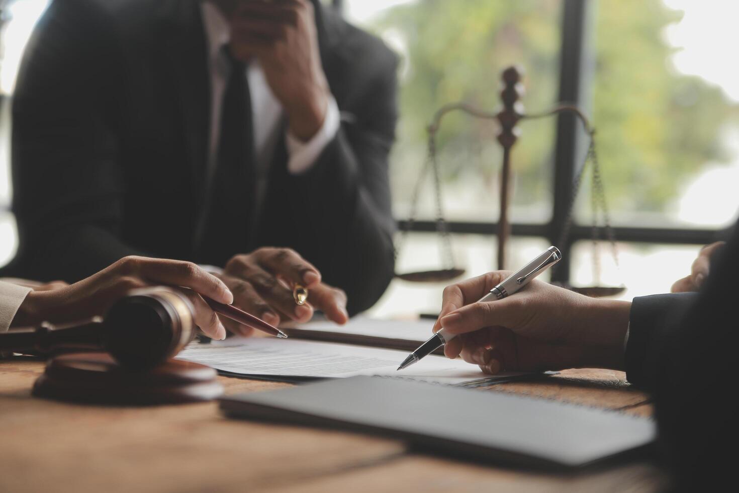 Good service cooperation, Consultation of Businesswoman and Male lawyer or judge counselor having team meeting with client, Law and Legal services concept. photo