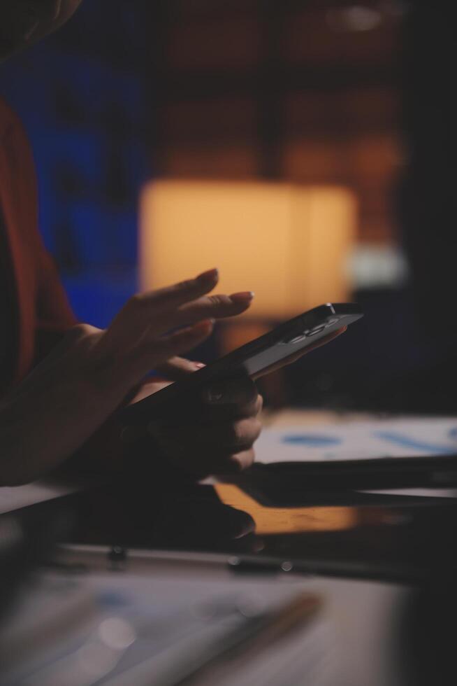 Business woman using calculator for do math finance on wooden desk in office and business working background, tax, accounting, statistics and analytic research concept photo