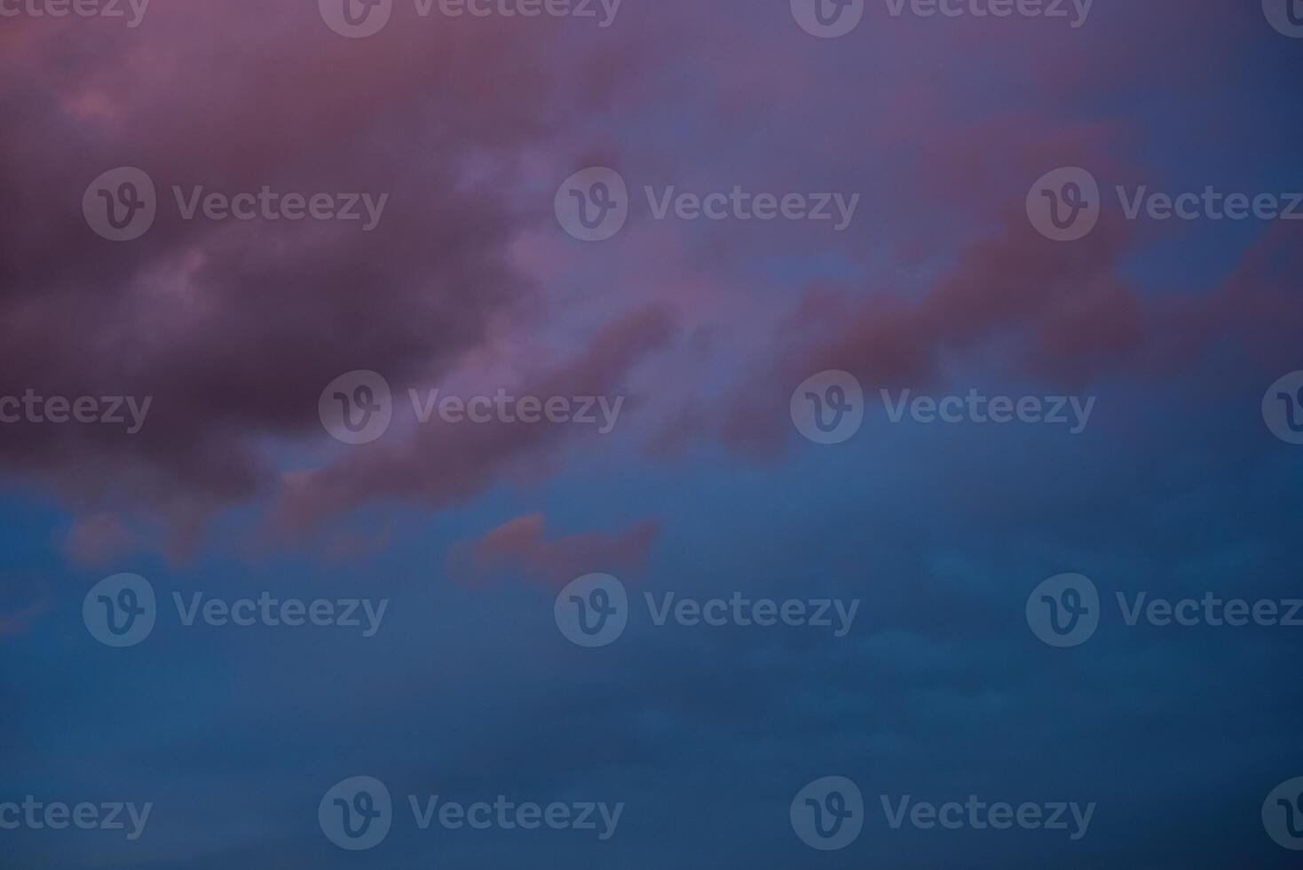 Beautiful scenic pink grey scenic gloomy cloudscape purple cloudy sky background photo