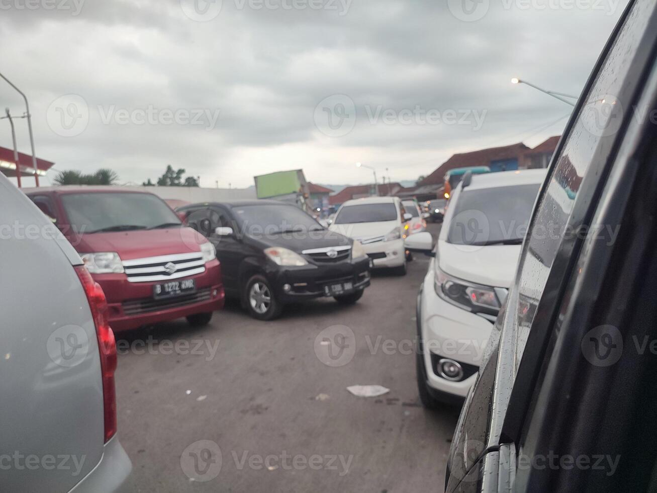 traffic jam on city road during rush hour photo