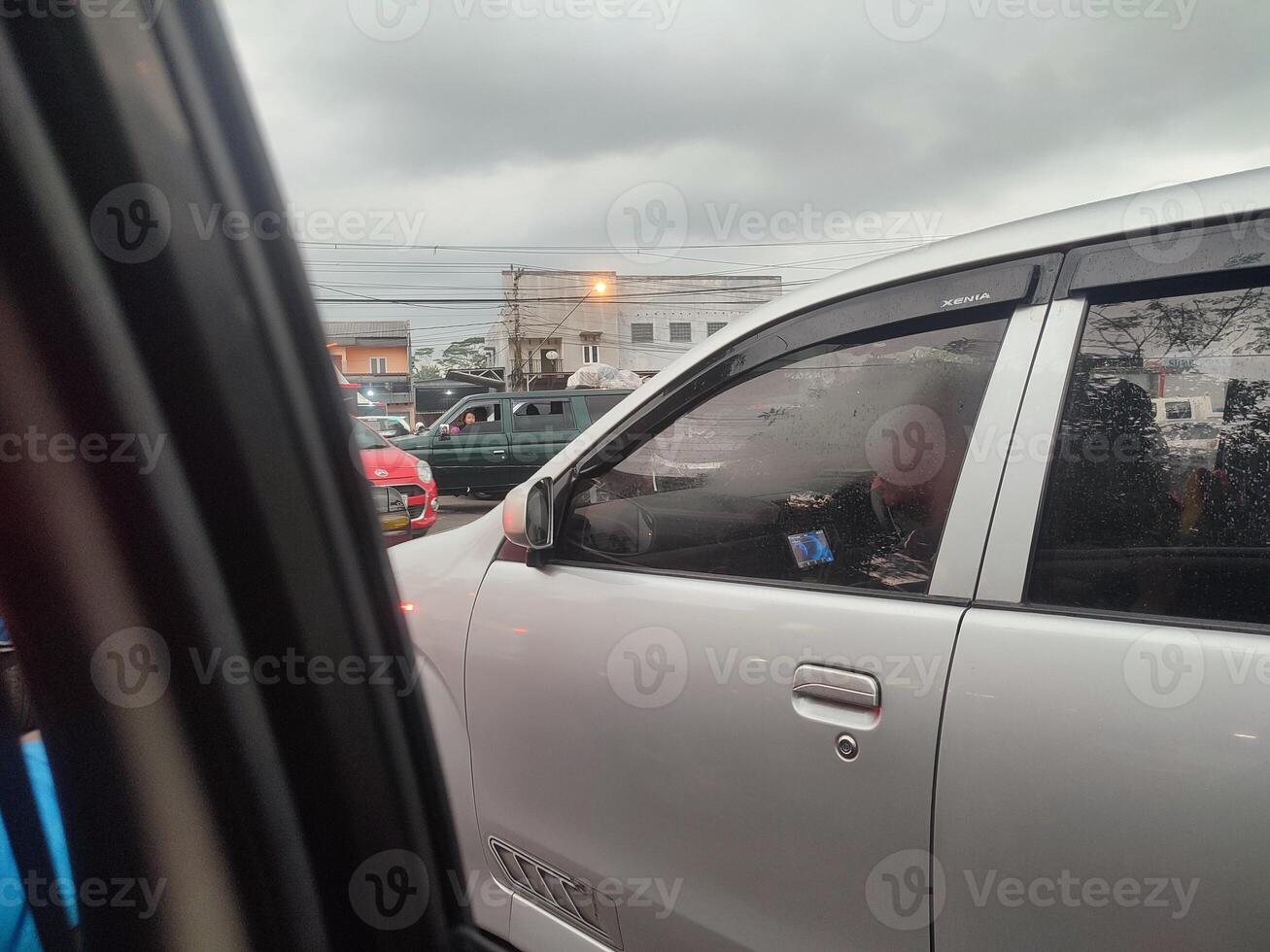 traffic jam on city road during rush hour photo