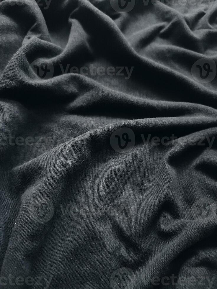 the texture and background of the fabric are black photo