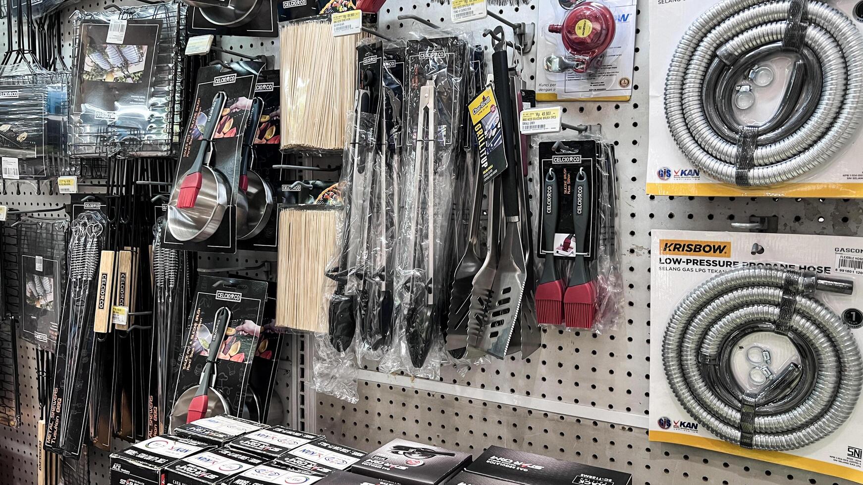 Various choice of hardware tools display in Ace store. Ace Hardware is a hypermarket of home product and building construction in Indonesia. Bekasi, Indonesia, May 1, 2024 photo