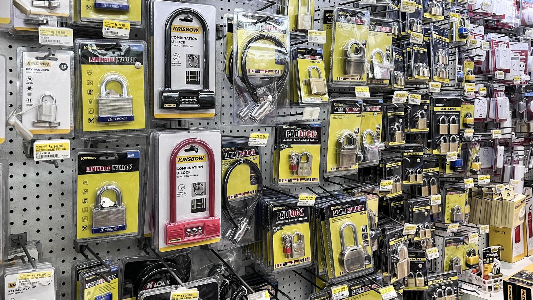 shelf with power tools in the store Ace hardware. Necessary tools for small repairs in everyday life. Bekasi, Indonesia, May 1, 2024 photo