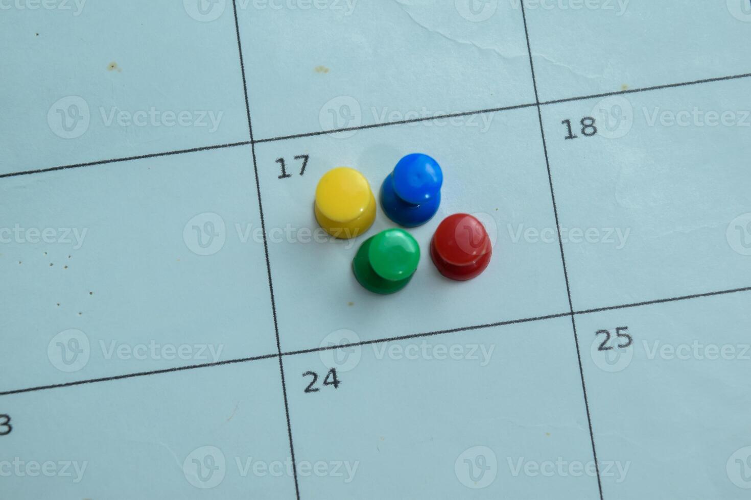 Concept of Pin on Calendar photo