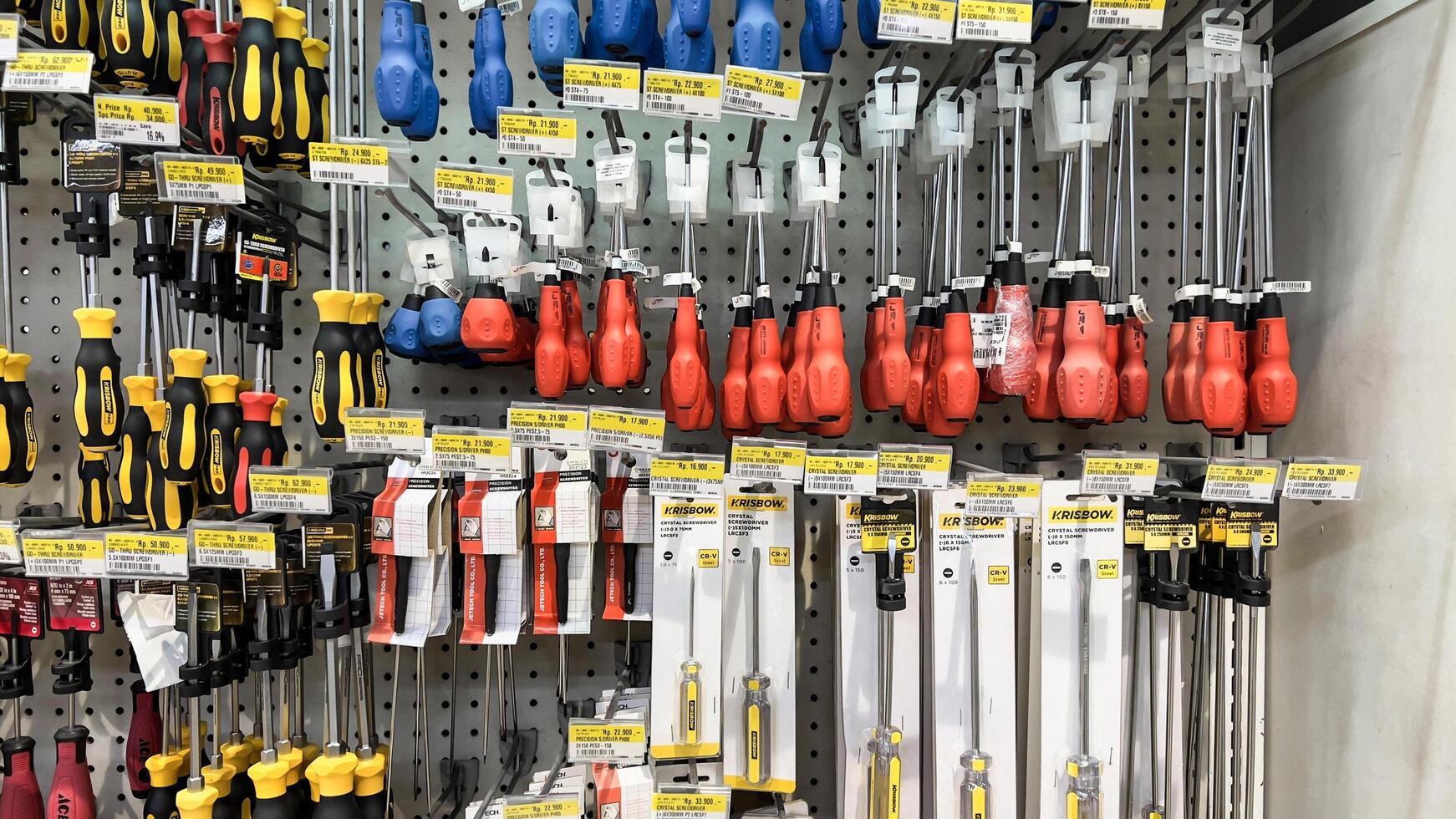shelf with power tools in the store Ace hardware. Necessary tools for small repairs in everyday life. Bekasi, Indonesia, May 1, 2024 photo