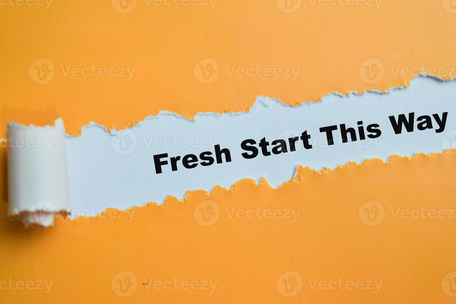 Concept of Fresh Start This Way Text written in torn paper. photo