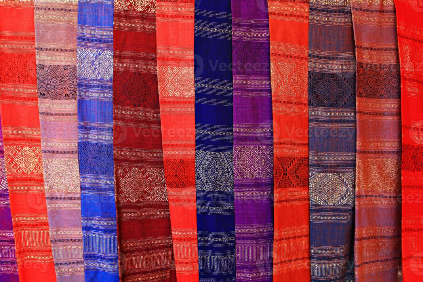 Various colors and patterns Handwoven silk from Laos photo
