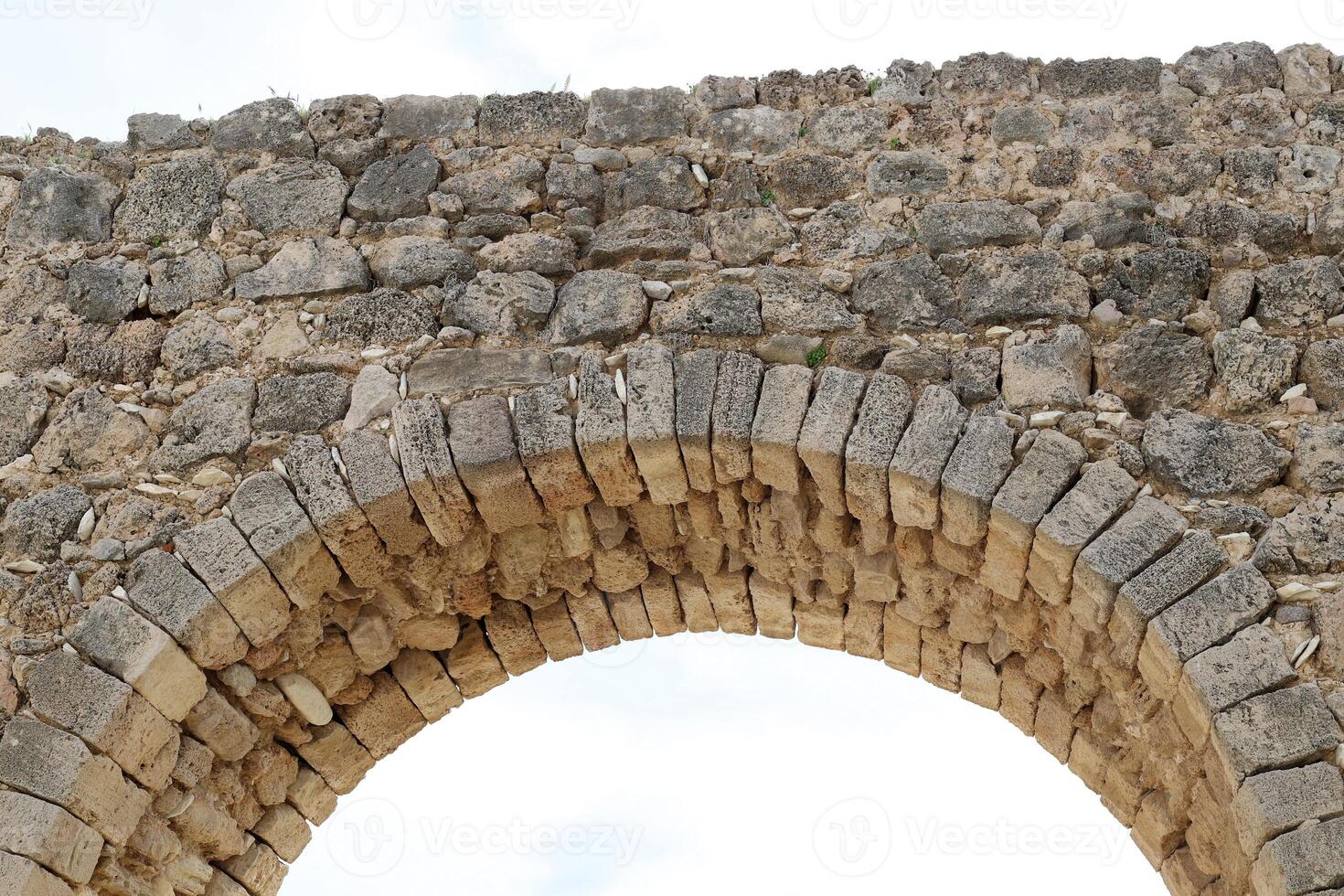 An ancient aqueduct for supplying water to populated areas. photo