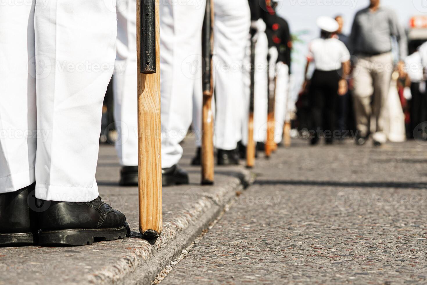 Group of marines wearing military boots in a patriotic parade. photo