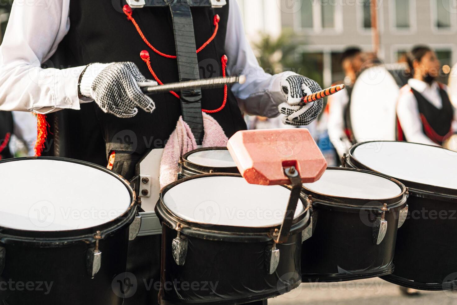Hands of a person playing in a marching band. photo