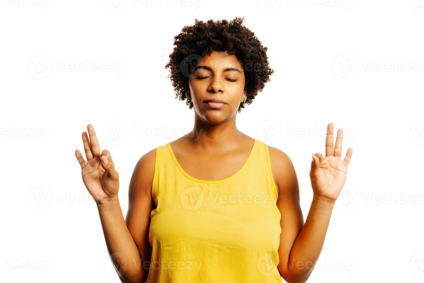Calm woman relaxing meditating, no stress free relief at work concept, mindful peaceful young businesswoman or student practicing breathing yoga exercises on isolated over lavender background photo