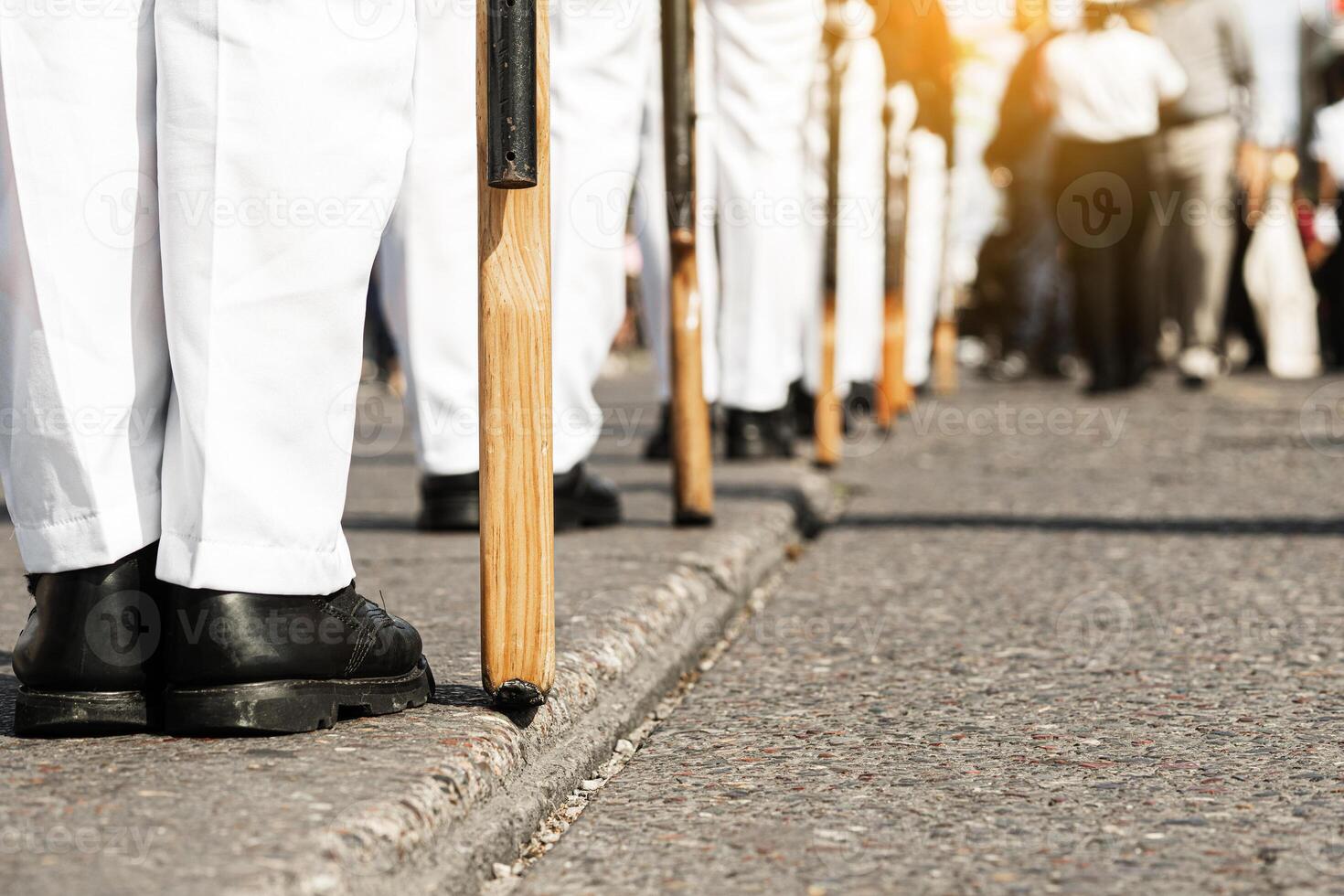 Group of marines wearing military boots in a patriotic parade. photo