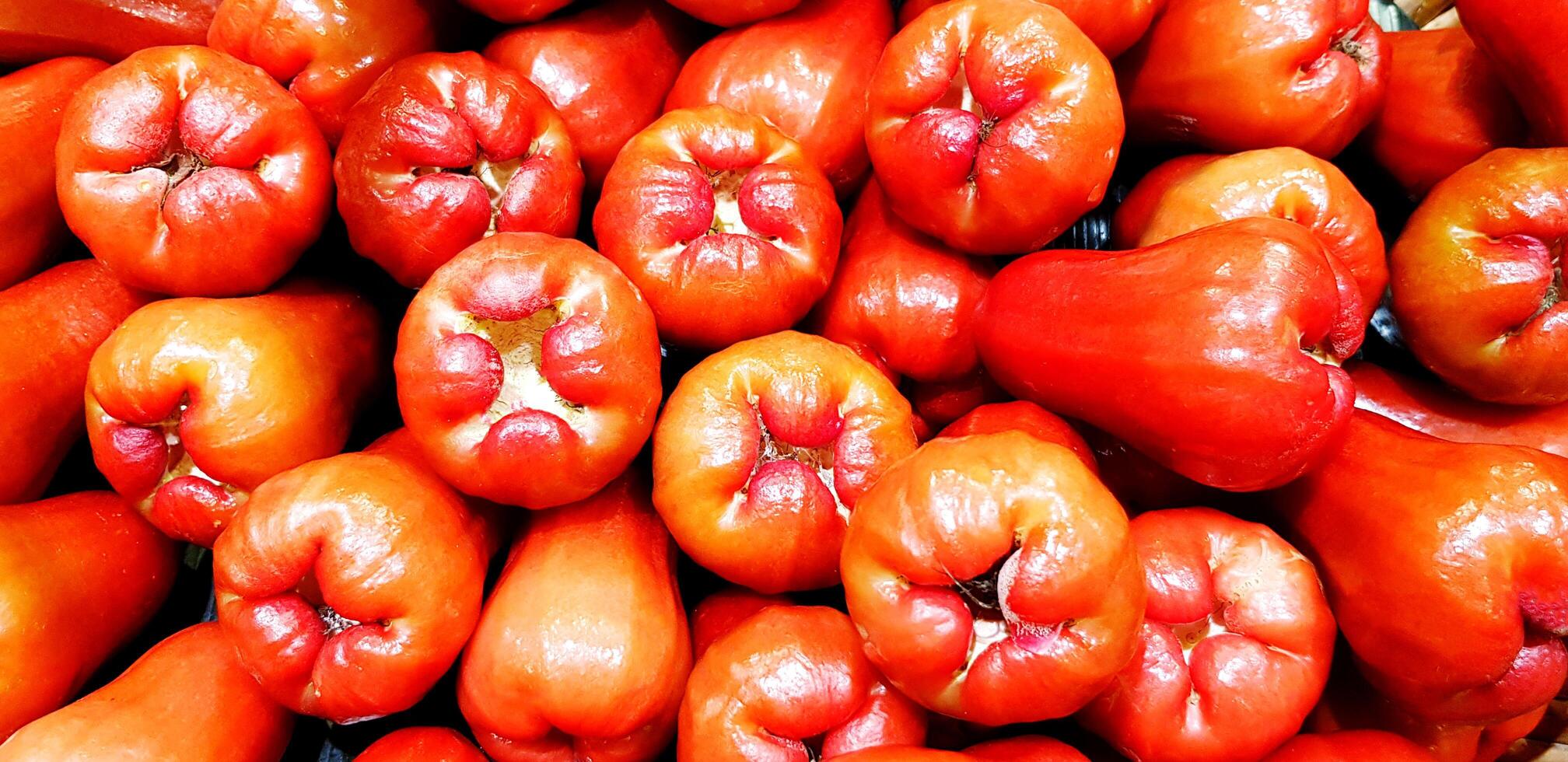 Group of fresh rose apple for sale at fruit market or supermarket. Freshness organic and healthy food. photo