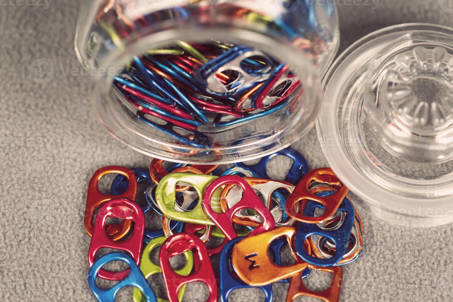 jar full of multi colored can pull tabs photo