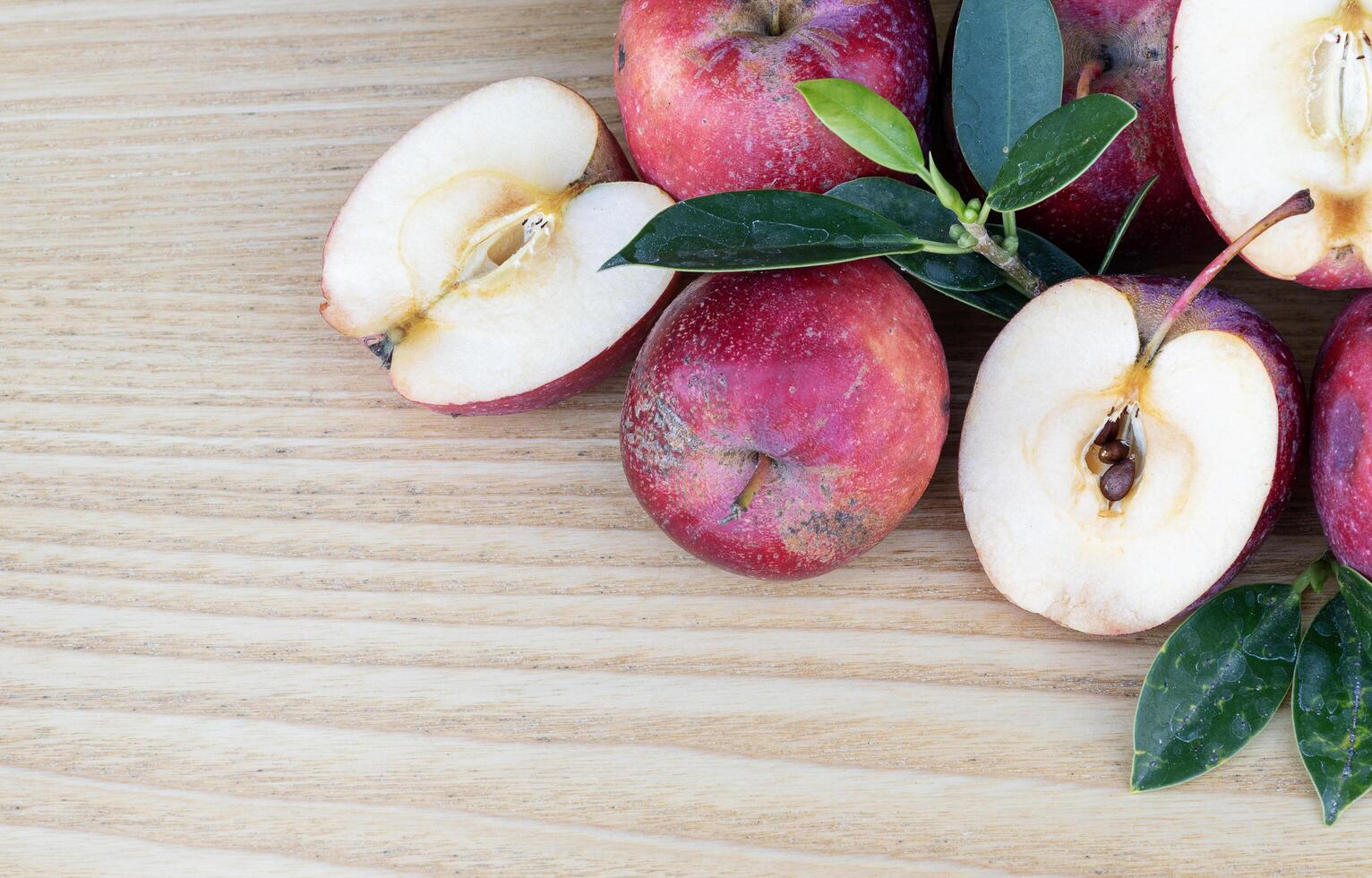 Apple slice on wooden floor photo