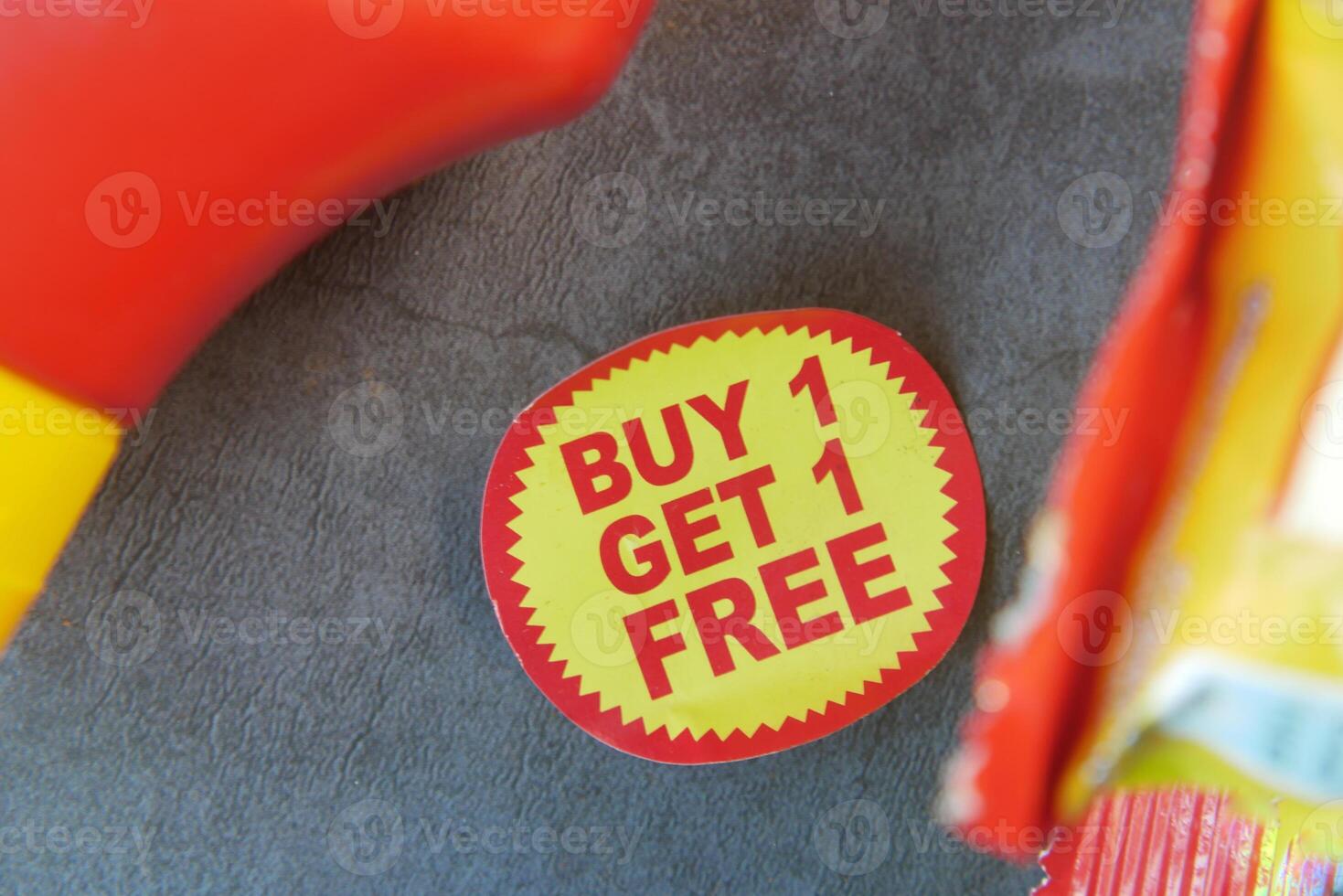 buy 1 get 1 free offer sticker and prodcuts on table photo