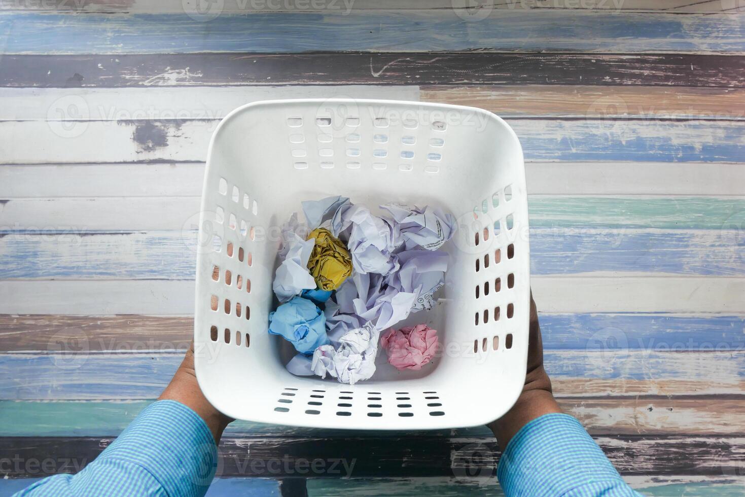 crumpled paper ball in a contianer. high angle view photo