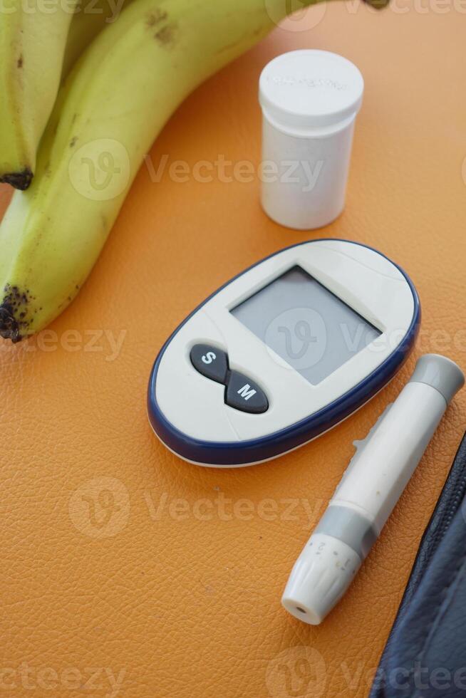 Close up of diabetic measurement tools and pills on color background photo