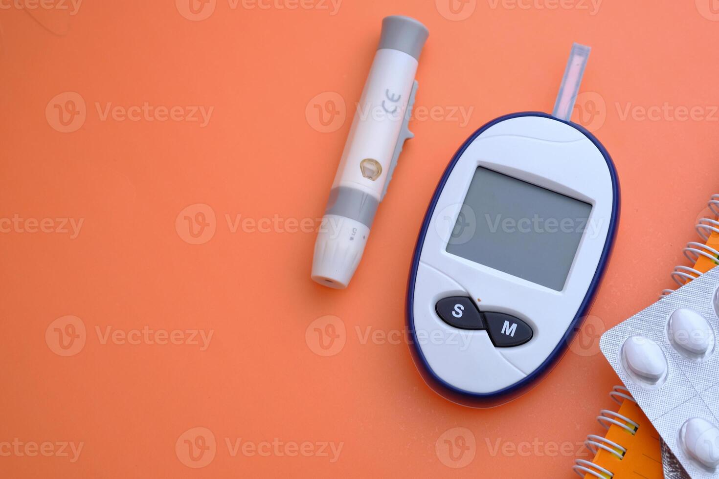 blood sugar measurement kits for diabetes on color background photo