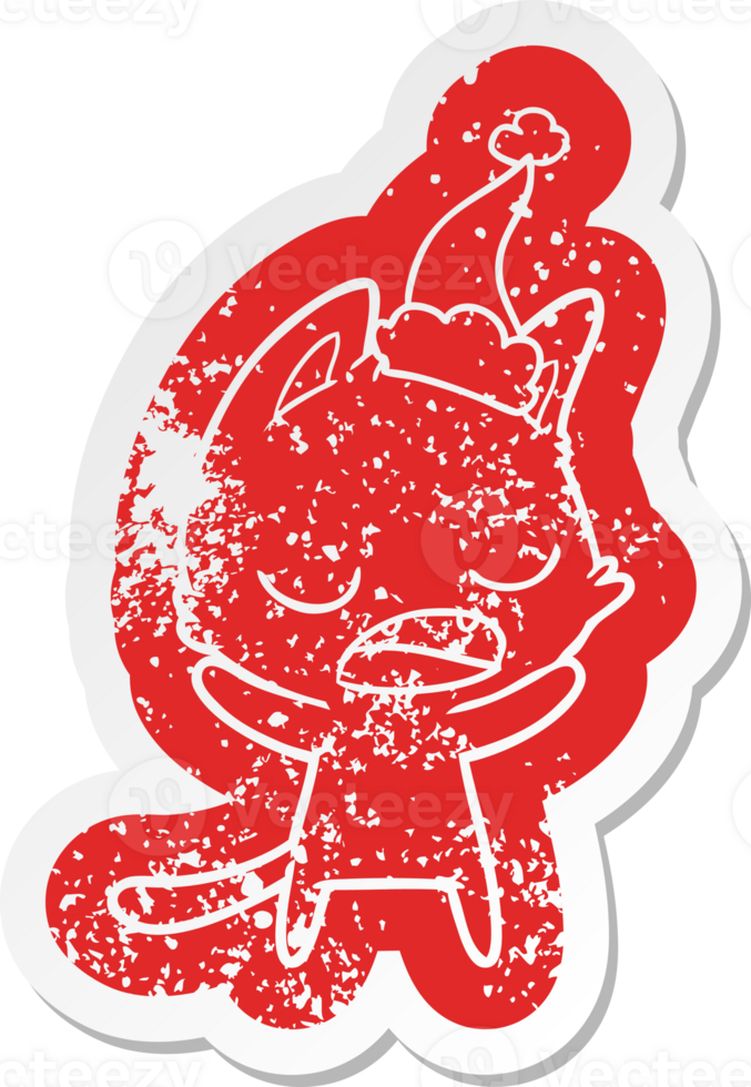 talking cat quirky cartoon distressed sticker of a wearing santa hat png