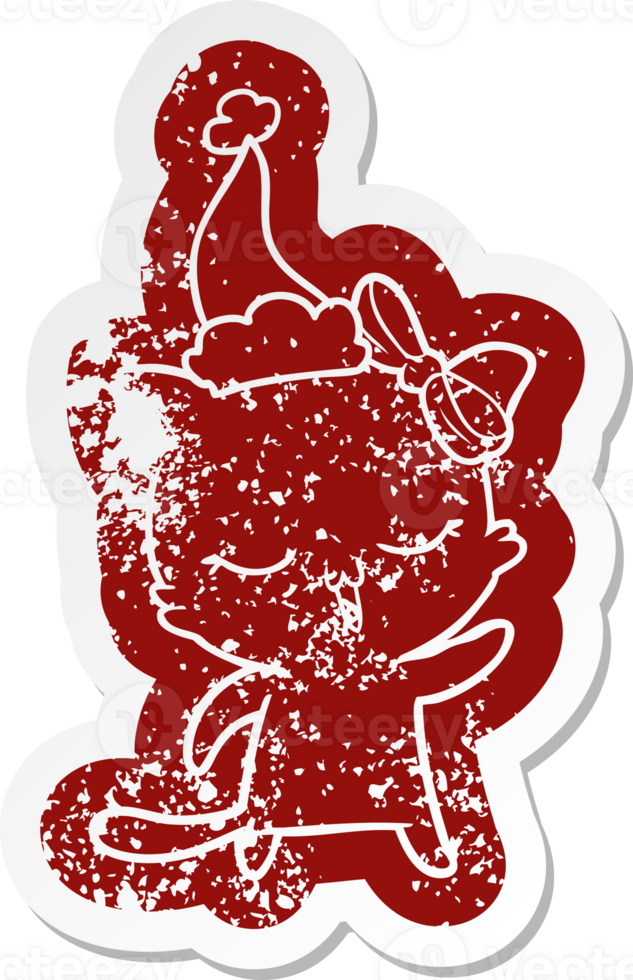 quirky cartoon distressed sticker of a cat with bow on head wearing santa hat png