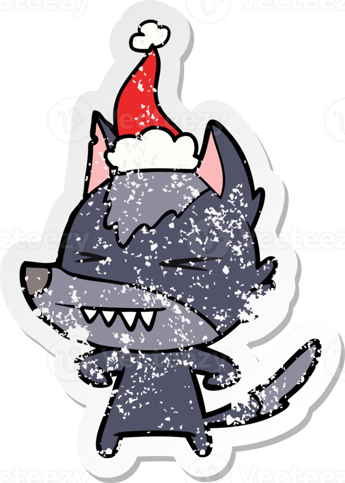 angry wolf hand drawn distressed sticker cartoon of a wearing santa hat png