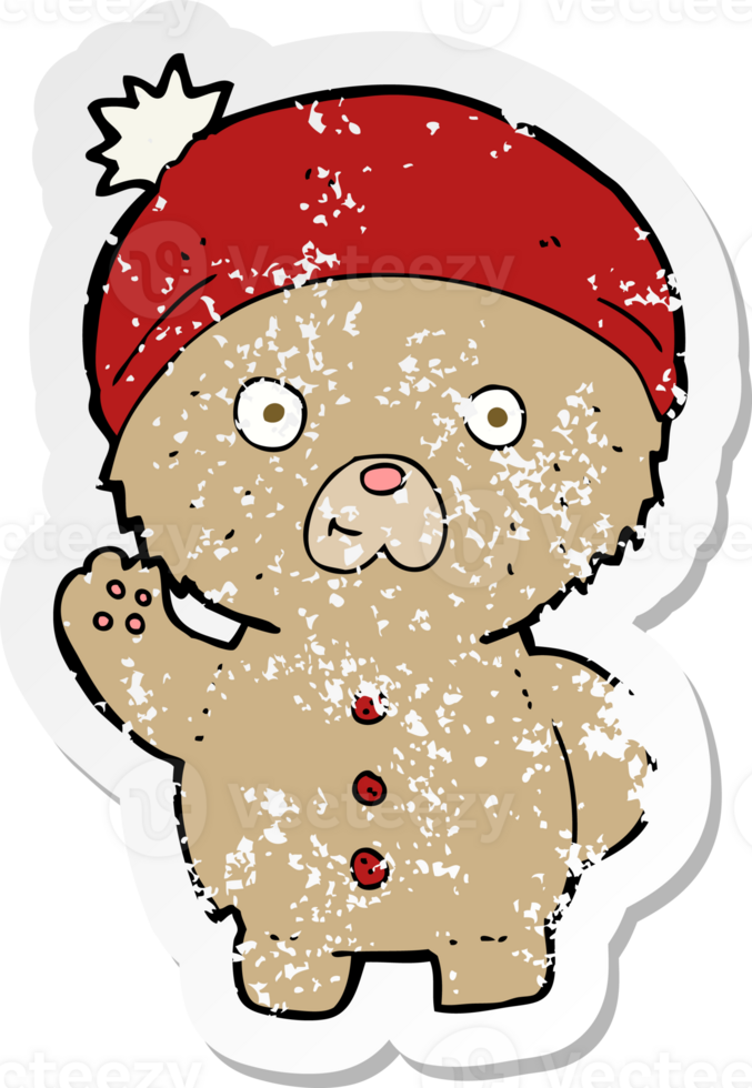 retro distressed sticker of a cartoon waving teddy bear in winter hat png